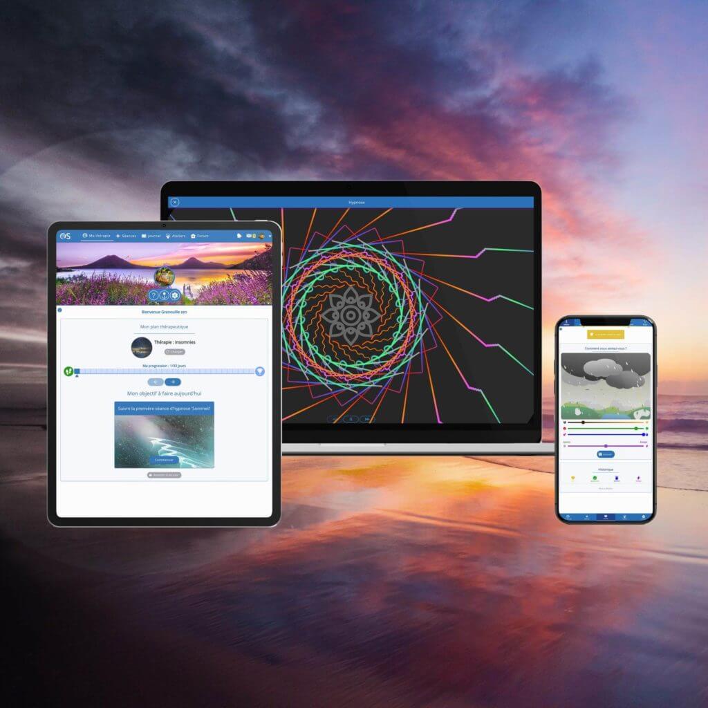 Image d'un ordinateur portable, d'une tablette et d'un téléphone avec un magnifique coucher de soleil en arrière-plan.